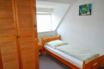 Ein Bett oder Betten in einem Zimmer der Unterkunft Hotel Hohenstein -Radweg-Messe-Baldeneysee
