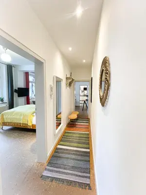 Ein Bett oder Betten in einem Zimmer der Unterkunft Apartments 