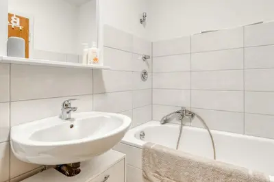 Ein Badezimmer in der Unterkunft Gutmensch Oberhausen 4 Schlafzimmer