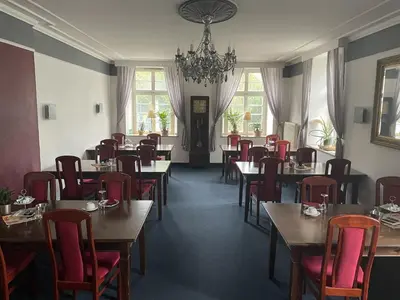 Ein Sitzbereich in der Unterkunft Hotel Jägerhof Kettwig
