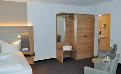 Ein Bett oder Betten in einem Zimmer der Unterkunft Hotel Restaurant Große Teichsmühle