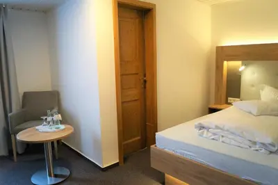 Ein Bett oder Betten in einem Zimmer der Unterkunft Hotel Restaurant Große Teichsmühle