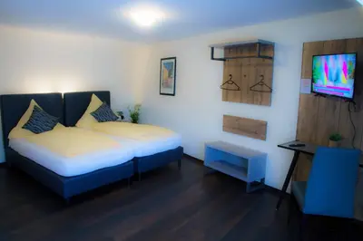Ein Bett oder Betten in einem Zimmer der Unterkunft Breer S Hotel
