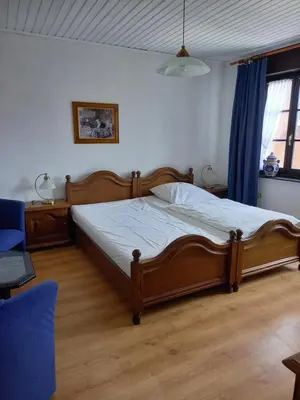 Ein Bett oder Betten in einem Zimmer der Unterkunft Mutter Siepe
