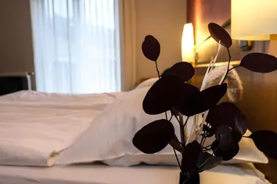 Ein Bett oder Betten in einem Zimmer der Unterkunft Hotel-Restaurant Zur Mühle