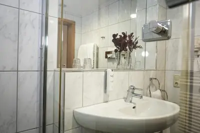 Ein Badezimmer in der Unterkunft Hotel-Restaurant Zur Mühle