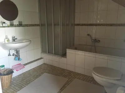 Ein Badezimmer in der Unterkunft Fair & the City