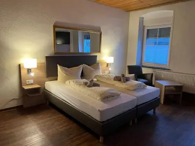 Ein Bett oder Betten in einem Zimmer der Unterkunft Tilla's Hof