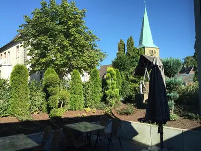 Ein Garten an der Unterkunft Hotel Grüner Baum