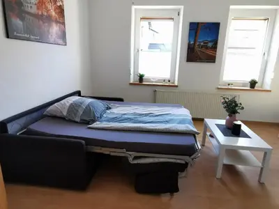 Ein Bett oder Betten in einem Zimmer der Unterkunft Gästewohnung am Mommbach
