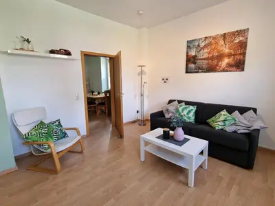 Ein Sitzbereich in der Unterkunft Gästewohnung am Mommbach