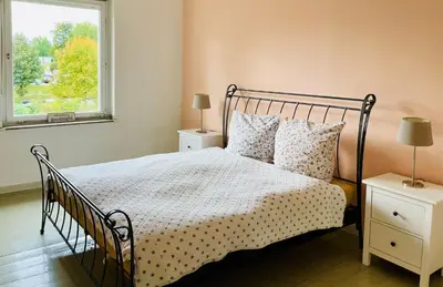 Ein Bett oder Betten in einem Zimmer der Unterkunft Beautiful apartment in a historic villa