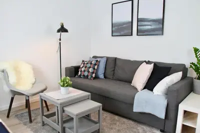 Ein Sitzbereich in der Unterkunft Apartmenthaus in der Metzstraße