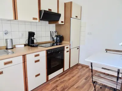 Küche/Küchenzeile in der Unterkunft Fewo Neukirchen mit Balkon