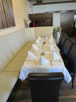 Ein Sitzbereich in der Unterkunft Gasthof Einhaus