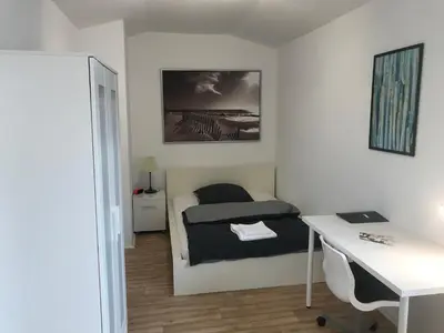 Ein Bett oder Betten in einem Zimmer der Unterkunft Monteurhome-Hagen