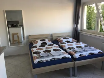 Ein Bett oder Betten in einem Zimmer der Unterkunft Tina