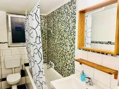 Ein Badezimmer in der Unterkunft Bismarck Bach Apartments