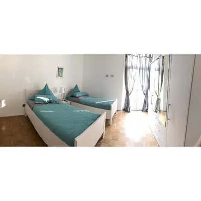 Ein Bett oder Betten in einem Zimmer der Unterkunft Ferienwohnung Branka