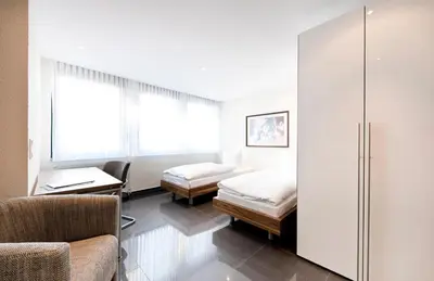 Ein Bett oder Betten in einem Zimmer der Unterkunft Appartements am Kleeblatt