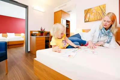 Ein Bett oder Betten in einem Zimmer der Unterkunft Hotel Franz