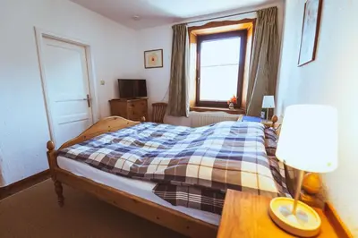 Ein Bett oder Betten in einem Zimmer der Unterkunft Gästehaus Kersting