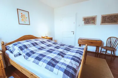 Ein Bett oder Betten in einem Zimmer der Unterkunft Gästehaus Kersting