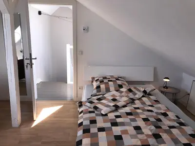 Ein Bett oder Betten in einem Zimmer der Unterkunft Privatzimmer Schönfelder