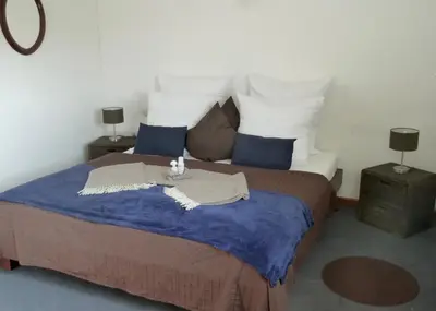 Ein Bett oder Betten in einem Zimmer der Unterkunft Hotel Zum Bügeleisen