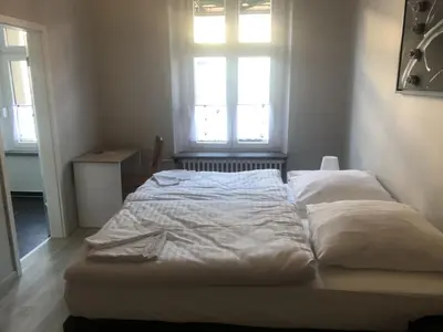 Ein Bett oder Betten in einem Zimmer der Unterkunft Hotel Schwaferts