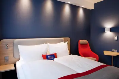 Ein Bett oder Betten in einem Zimmer der Unterkunft Holiday Inn Express - Mülheim - Ruhr by IHG