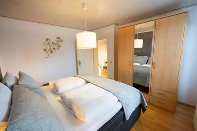 Ein Bett oder Betten in einem Zimmer der Unterkunft Ferienwohnung Menden