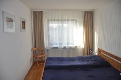 Ein Bett oder Betten in einem Zimmer der Unterkunft Ferienwohnung Raiser