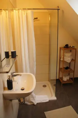 Ein Badezimmer in der Unterkunft Dachstudio Bisping33