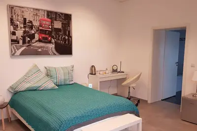 Ein Bett oder Betten in einem Zimmer der Unterkunft Zimmervermietung Mülheim