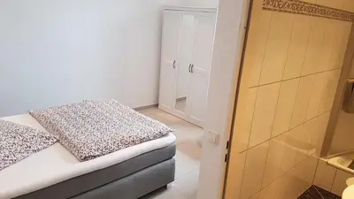 Ein Bett oder Betten in einem Zimmer der Unterkunft Zimmervermietung Mülheim