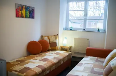Ein Bett oder Betten in einem Zimmer der Unterkunft Quadenhof
