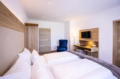 Ein Bett oder Betten in einem Zimmer der Unterkunft Landgasthof-Hotel Zum Steverstrand