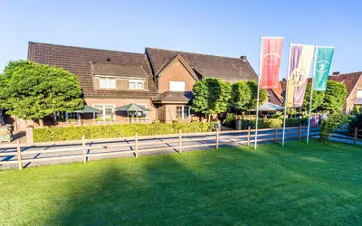Ein Garten an der Unterkunft Gasthaus Eickholt GmbH