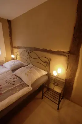Ein Bett oder Betten in einem Zimmer der Unterkunft Historisch übernachten Brinkerplatz 3