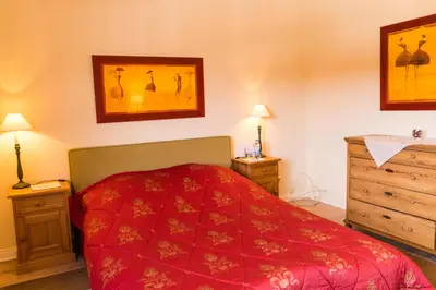 Ein Bett oder Betten in einem Zimmer der Unterkunft Forsthaus Edelburg Ferienhaus