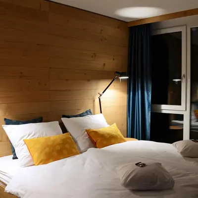 Ein Bett oder Betten in einem Zimmer der Unterkunft Claudius Hotel
