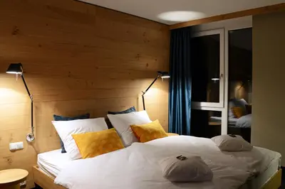 Ein Bett oder Betten in einem Zimmer der Unterkunft Claudius Hotel