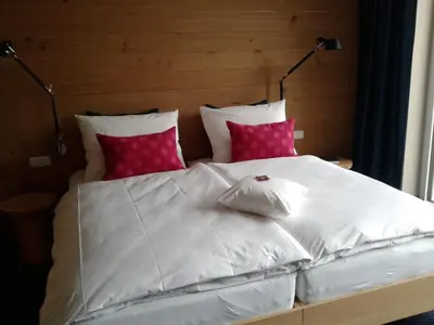 Ein Bett oder Betten in einem Zimmer der Unterkunft Claudius Hotel