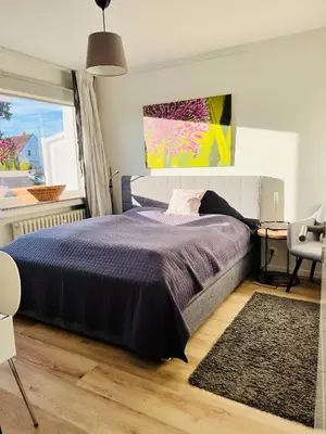 Ein Bett oder Betten in einem Zimmer der Unterkunft Neues, ruhiges Apartment Nordic in Düsseldorf-Nord