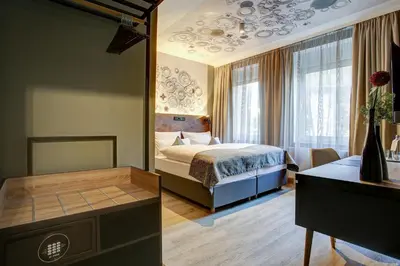 Ein Bett oder Betten in einem Zimmer der Unterkunft Boutique Essen City