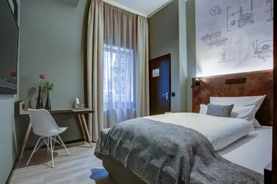 Ein Bett oder Betten in einem Zimmer der Unterkunft Boutique Essen City