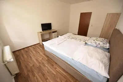 Ein Bett oder Betten in einem Zimmer der Unterkunft Design Apartments 2