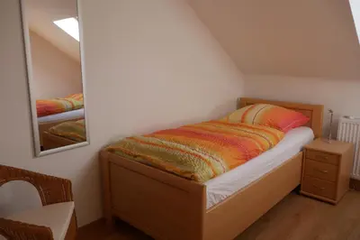 Ein Bett oder Betten in einem Zimmer der Unterkunft Apartment Fewo Central