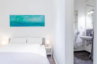 Ein Bett oder Betten in einem Zimmer der Unterkunft Apartment 229